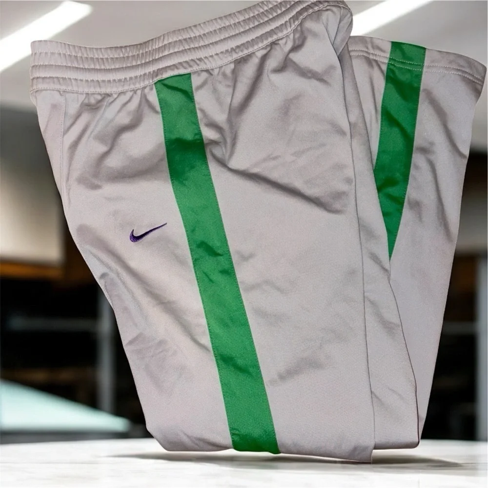 Nike Kids White Joggers with Green and Purple Accents